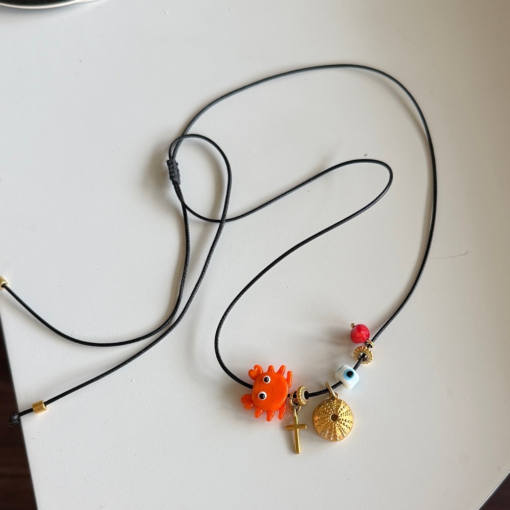 Black Cord Necklace with Crab, Cross & Evil eye Charm